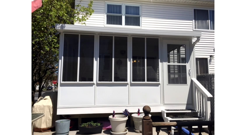 White Enclosures with Storm Doors and Windows